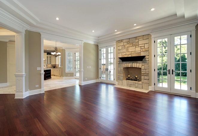 elegant, herringbone patterned wood flooring in a formal dining room